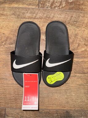 Nike Black Slides with White Swoosh Logo
